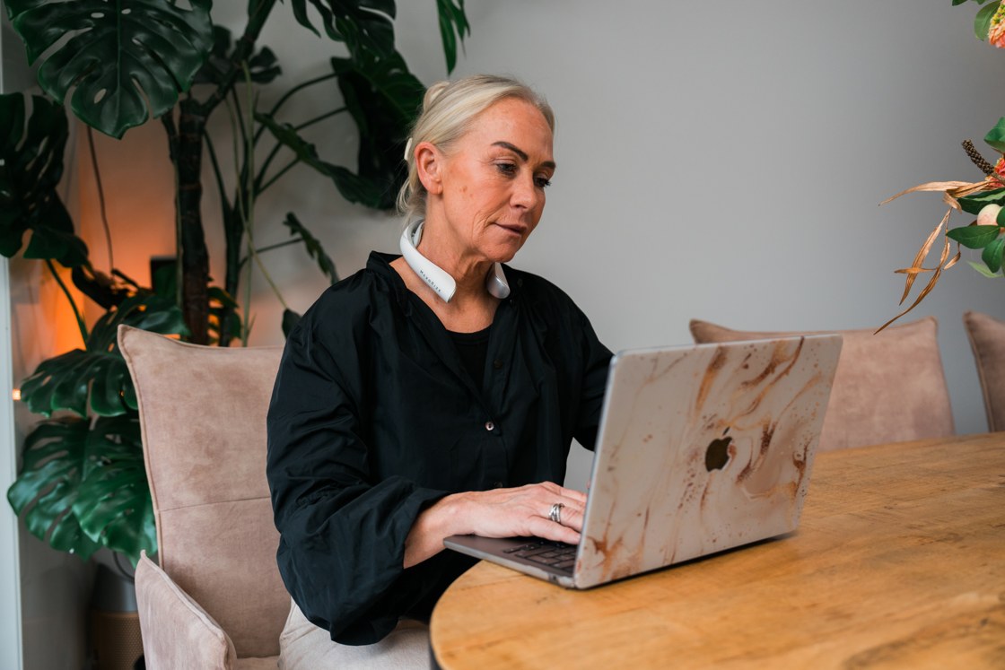Model wearing Professional X during a quiet moment working at home